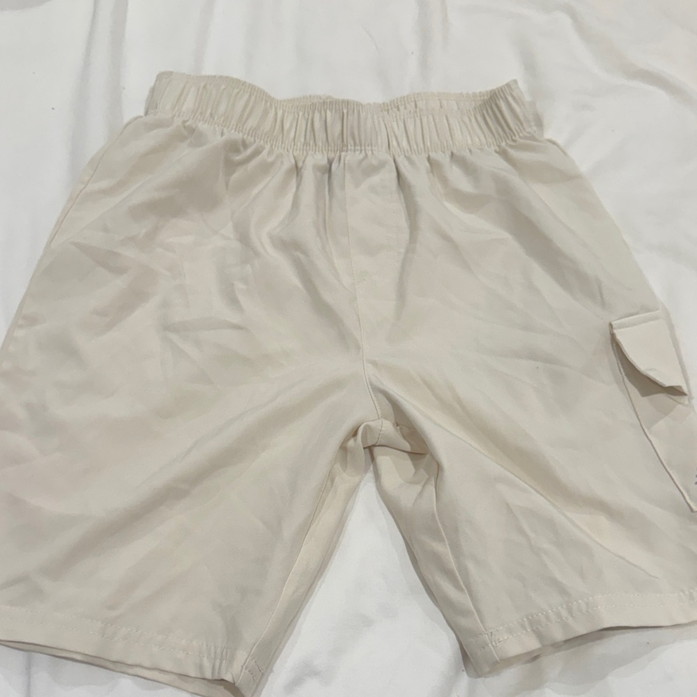 Boys cream golf shorts 10Y never worn